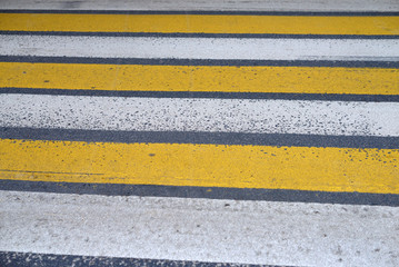 Fototapeta premium yellow and white Zebra crossing