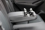 armrest in the car with can holders, rear seats