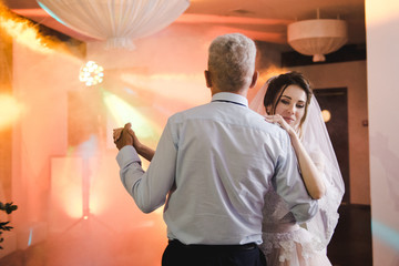 Bride dancing with dad. Father and daughter dance. Wedding. The bride and her father. Crying....