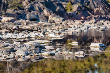 Coast at the baltic sea with boulders and rocks