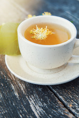 linden flowers herbal Cup of healthy tea with honey. alternative or complementary medicine, traditional medicine. soft focus image