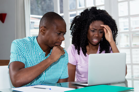 African american couple with computer problems