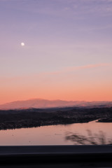 As the Sun Sets the Moon Rises