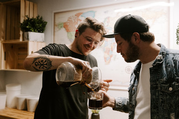 Freshly Brewed Single Origin Roasted Coffee Blooming and Brewing in Glass Chemex Vase