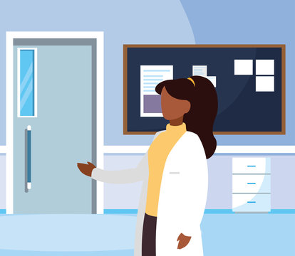 afro female medicine worker in hospital corridor