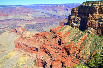 Grand Canyon is a steep-sided canyon carved by the Colorado River  adjacent rim are contained...