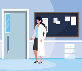 female medicine worker in hospital corridor