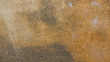 Background of the old wall. Texture of stone surface. Abstract background in retro style. Brown surface of solid material