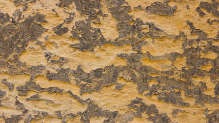 Background of the old wall. Texture of stone surface. Abstract background in retro style. Brown surface of solid material