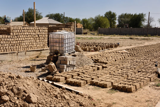 Mud bricks sun drying at residential construction site development near Shymkent Kazakhstan