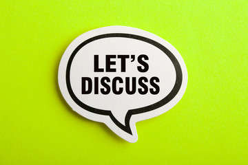 Let Us Discuss Speech Bubble Isolated On Yellow Background