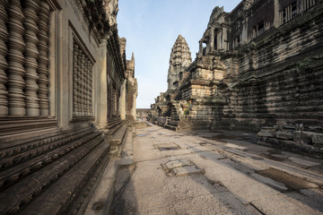 Tourists inside the upper tower area of Angkor Wat temple, Siem Reap, Cambodia
