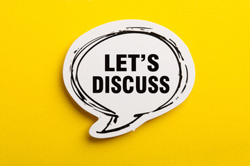 Let Us Discuss Speech Bubble Isolated On Yellow Background