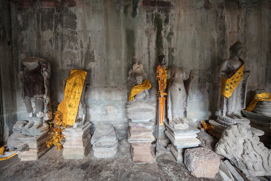 View inside Angkor Wat temple looking towards a Buddhist shrine, Siem Reap, Cambodia