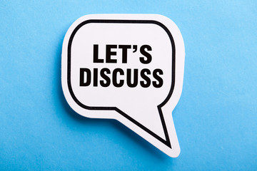 Let Us Discuss Speech Bubble Isolated On Blue Background