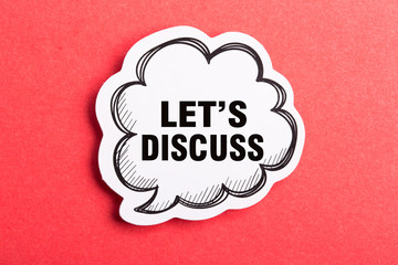 Let Us Discuss Speech Bubble Isolated On Red Background