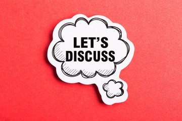 Let Us Discuss Speech Bubble Isolated On Red Background