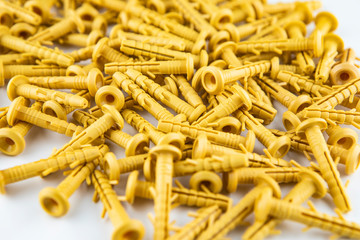 Yellow dowel on a white