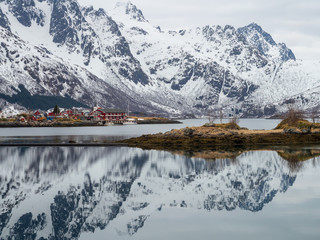 Reflection of mountain on fjord  during winter, Norway