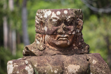 Head sculptures outside the north gate at Angkor Thom temple complex, Siem Reap, Cambodia