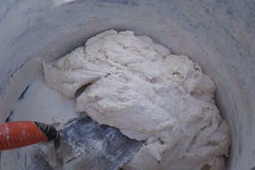 Cement plaster glue close up