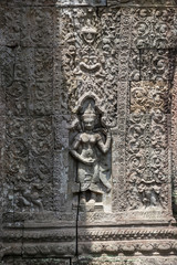 Sculpture and bas relief detail at Preah Khan temple in Siem Reap, Cambodia