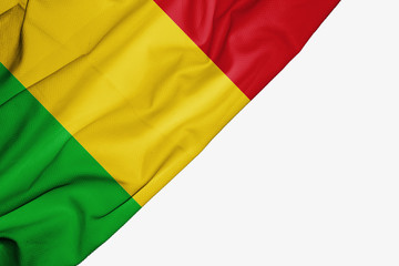 Mali flag of fabric with copyspace for your text on white background.