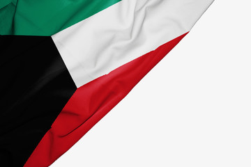 Kuwait flag of fabric with copyspace for your text on white background.