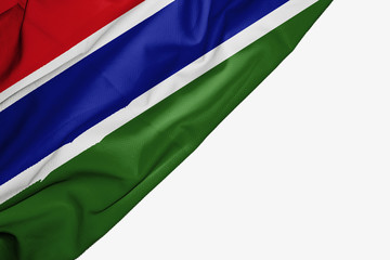 Gambia flag of fabric with copyspace for your text on white background.
