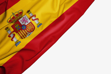 Fototapeta premium Spain flag of fabric with copyspace for your text on white background.