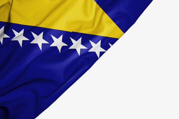 Bosnia and Herzegovina flag of fabric with copyspace for your text on white background.