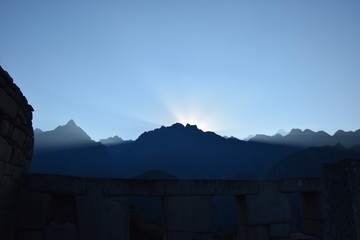 Machu Picchu Sunrise behind Mountains
