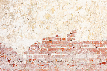 Red Old Weathered Brick Wall With Beaten Pieces Of Whitewash, Putty And Plaster. Fragment Of Wall Surface Of Historic Building With Chips, Cracks And Damages.