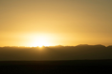 Fototapeta na wymiar The sun peered over helan peak.