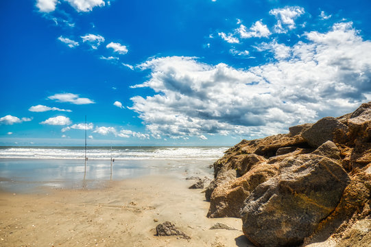 Puffy White Clouds Over The Beach In Pawleys Island, SC.