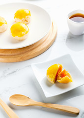 East asian afternoon tea food and drink Concept Flat lay mid-autumn festival ,Spring Roll pastry with nuts , salted eggs.