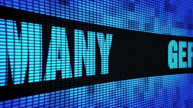 GERMANY Side Text Scrolling on Light Blue Digital LED Display Board Pixel Light Screen Looped Animation 4K Background. Sign Board , Blinking Light, Pixel Monitor . LED Wall Pannel