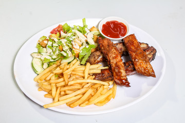 grilled meat and french fries