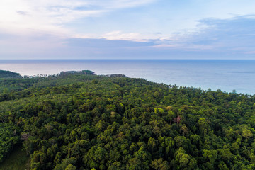 Fototapeta na wymiar Aerial view sea island with tree forest on mountain