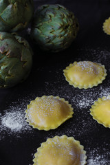 closeup artichoke ravioli. Vegan organic pasta.