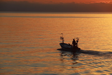Fototapeta premium fish and fishing, sunrise fishermen