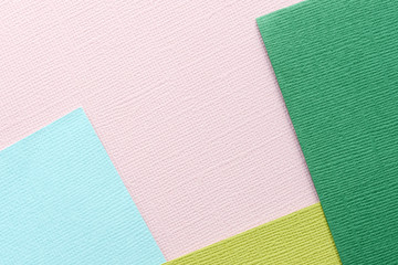 Fototapeta premium Pink, green, blue abstract paper background. Paper texture