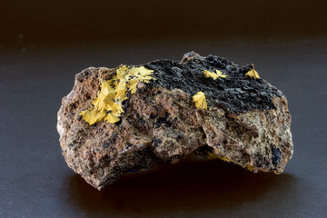 Boltwoodite mineral specimen from Arandis Namibia. Radial cluster of yellow needles in compact spheres.