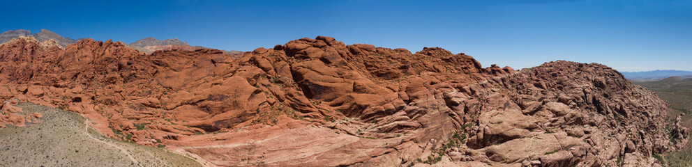 Panoramic aerial scenic view of rock formations at Red Rock Canyon National Conservation Area in Nevada, USA. Calica, touristic place with natural scenery near Las Vegas city.