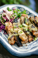 roast chicken with garlic and coriander sauce and pickled vegetables salad