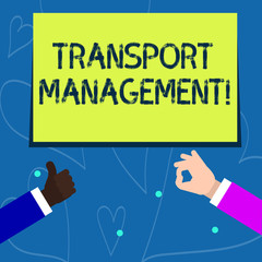 Conceptual hand writing showing Transport Management. Concept meaning analysisaging aspect of vehicle maintenance and operations Two Businessmen Hands Gesturing the Thumbs Up and Okay Sign