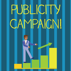 Writing note showing Publicity Campaign. Business concept for an effort to convey essential information to the public Smiling Businessman Climbing Bar Chart Following an Arrow Up