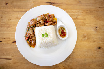 spicy fried pork Thai food with herb serve