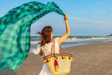 Woman walking on beach