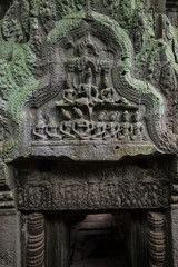 Beautiful sculpture at the Ta Prohm temple ruins in Siem Reap, Cambodia